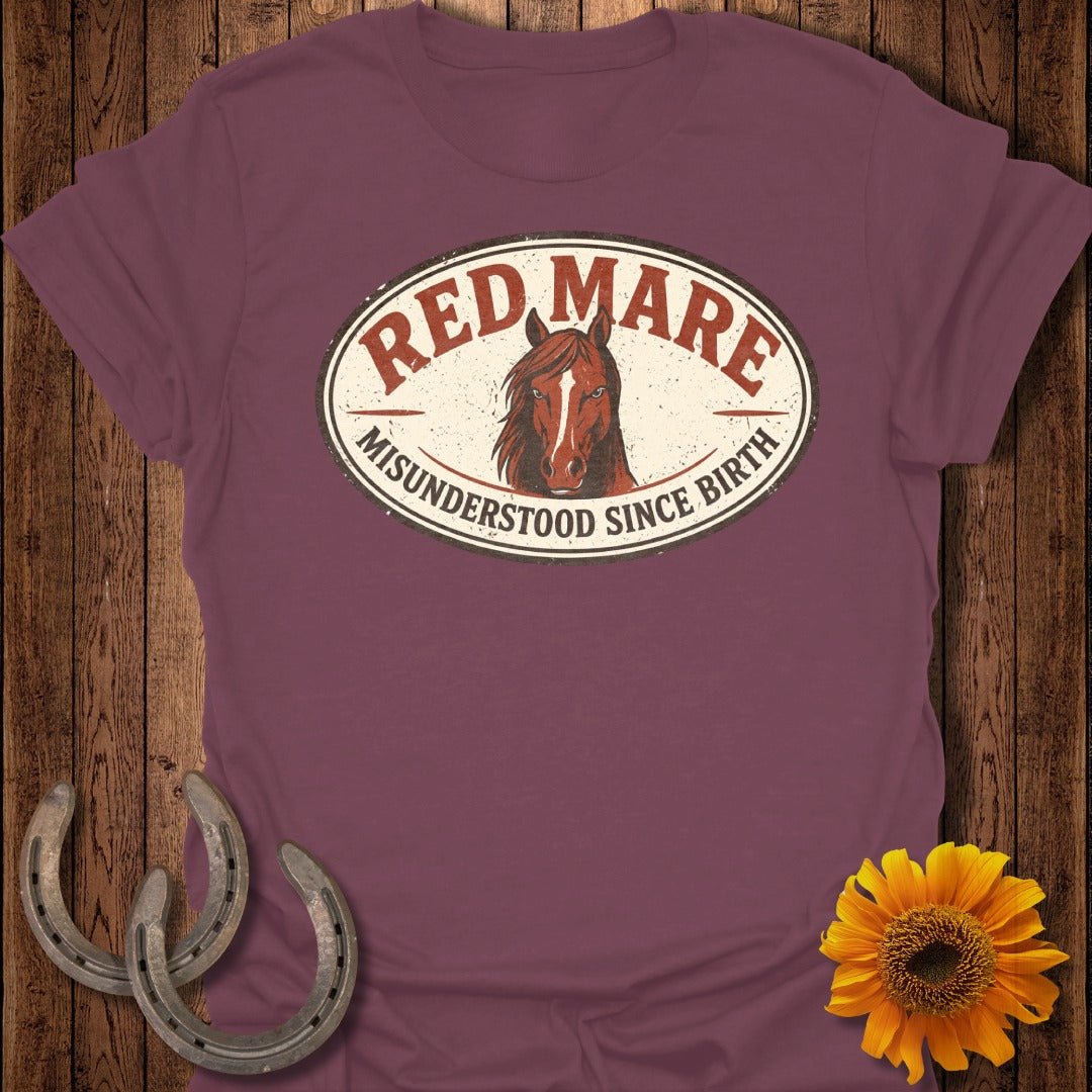 Burgundy t-shirt with oval logo: Red Mare Misunderstood Since Birth.