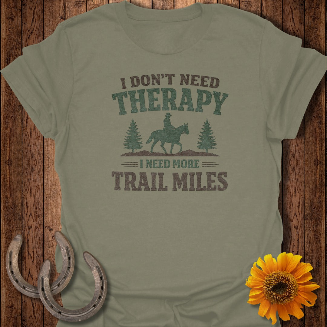 Green t-shirt with text "I DON'T NEED THERAPY I NEED MORE TRAIL MILES".