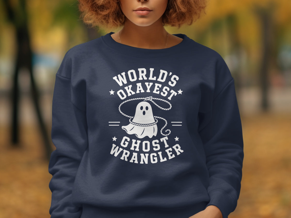 Navy sweatshirt with "World's Okayest Ghost Wrangler" text and ghost graphic.