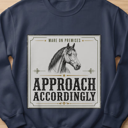 Dark blue sweatshirt featuring a distressed graphic of a horse head with "Mare on Premises" and "Approach Accordingly".