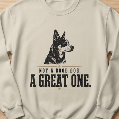 Cream sweatshirt with black and white dog and text "NOT A GOOD DOG. A GREAT ONE."