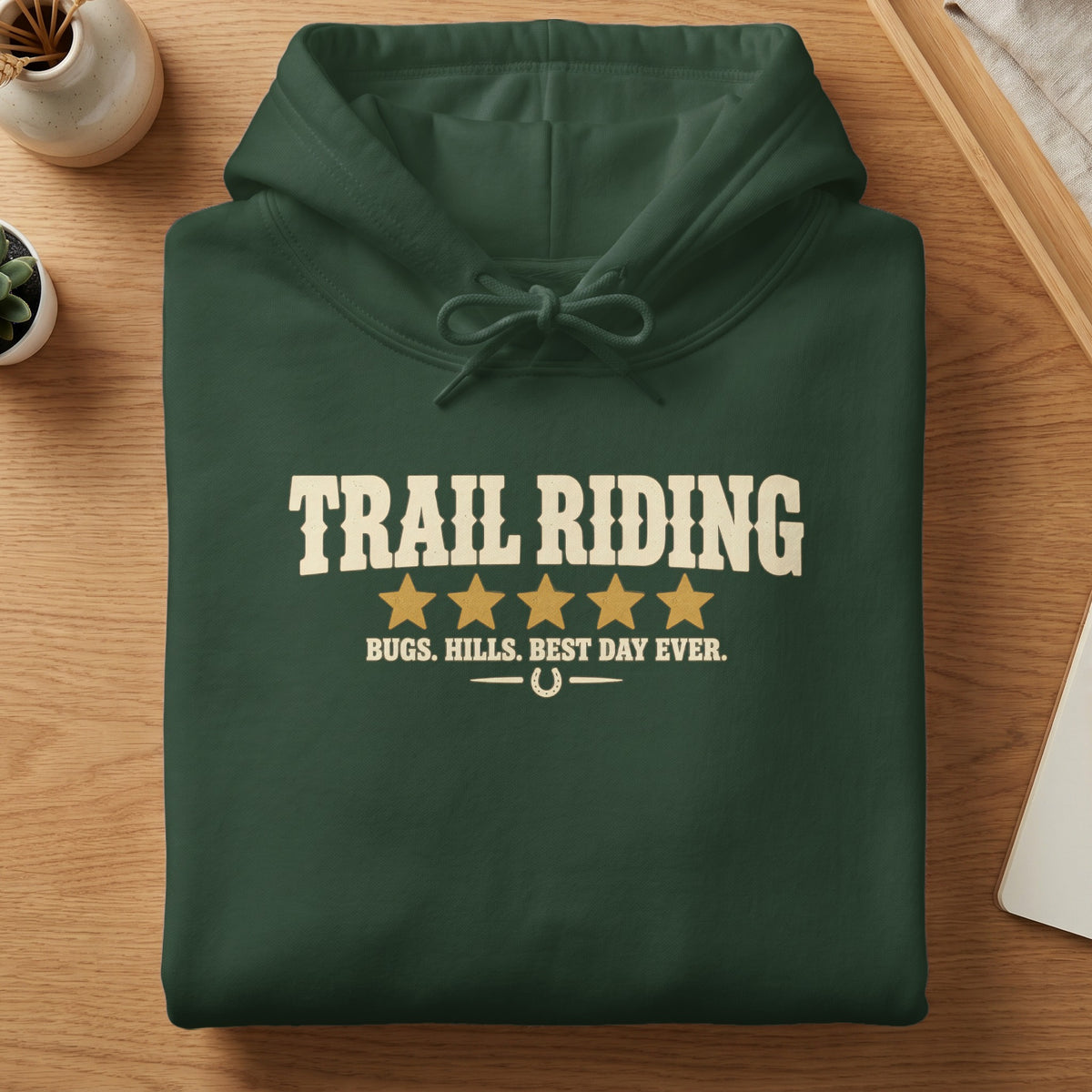 Green hoodie with "TRAIL RIDING" and five stars, "BUGS. HILLS. BEST DAY EVER."