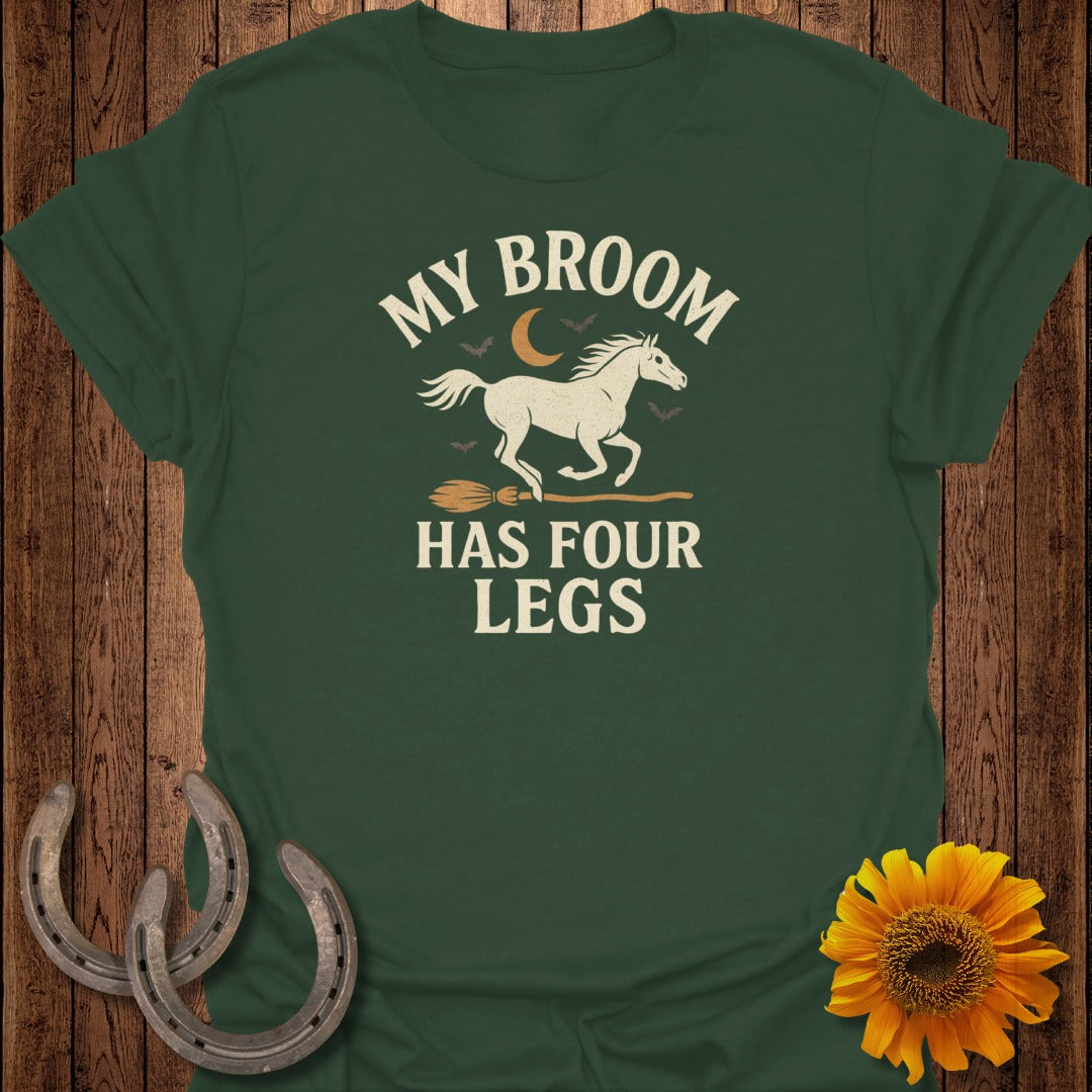 Green t-shirt with white text "MY BROOM HAS FOUR LEGS" and horse illustration.