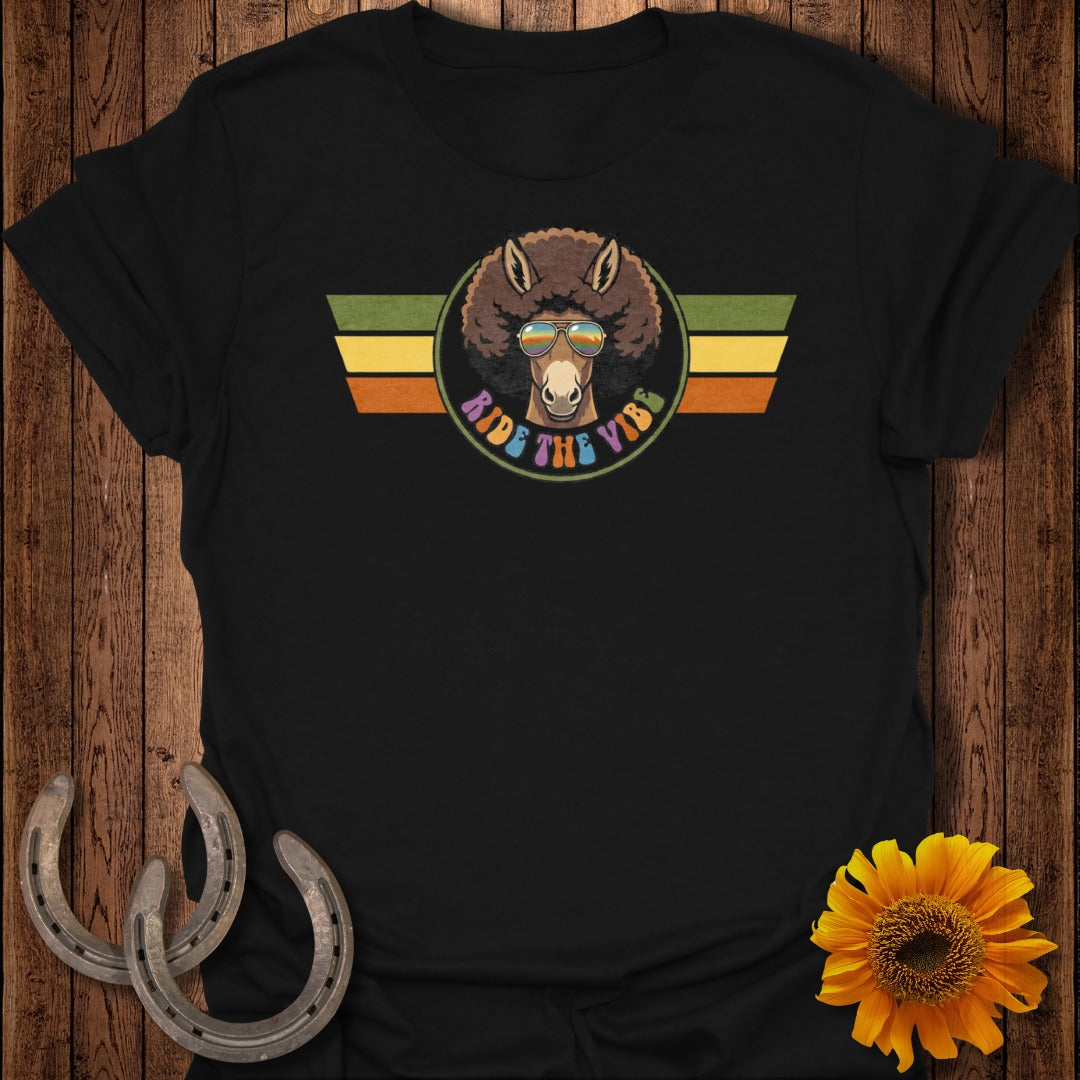 Black t-shirt with retro donkey graphic and "Ride the Vibe" text.