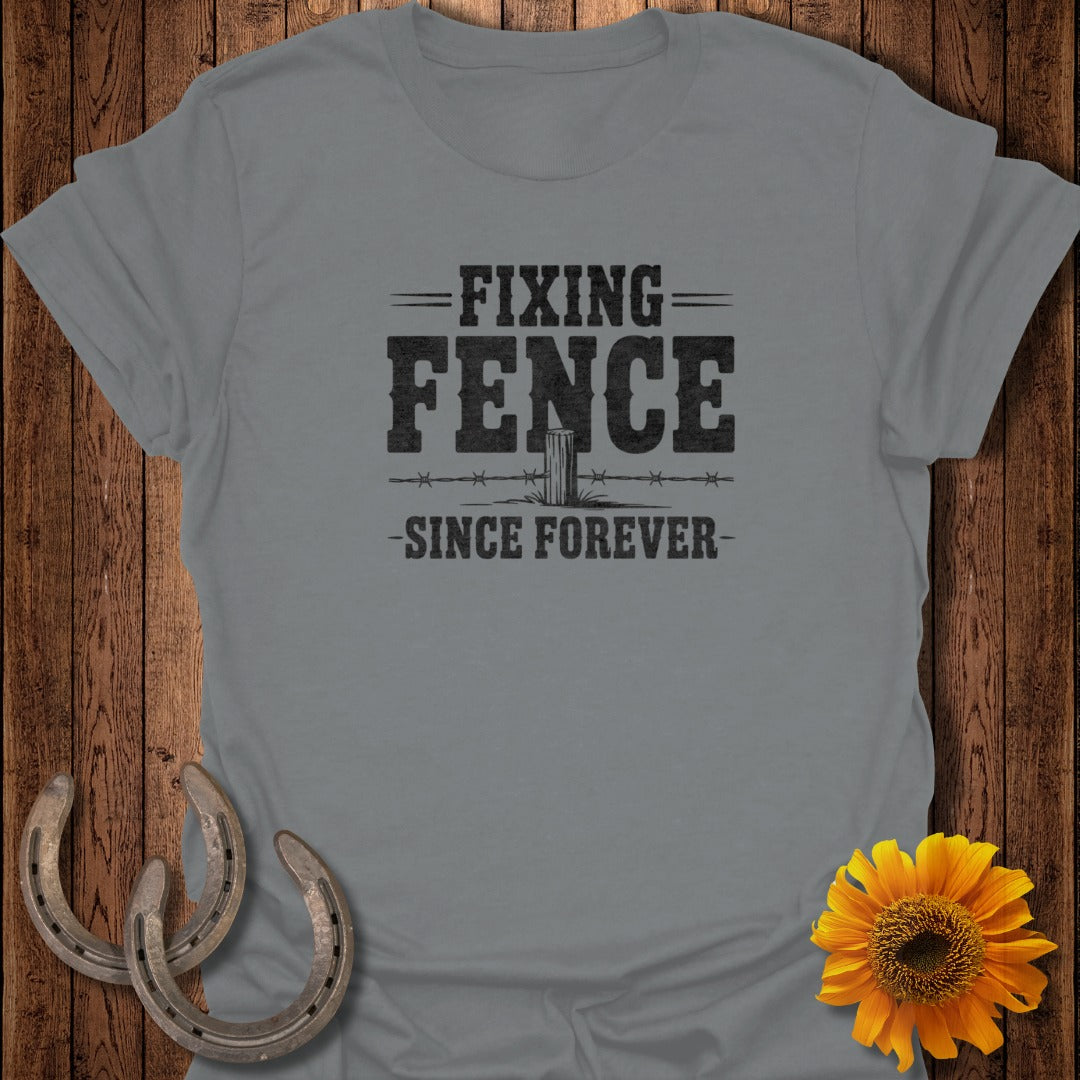 Gray t-shirt with "FIXING FENCE - SINCE FOREVER" text and barbwire graphic.