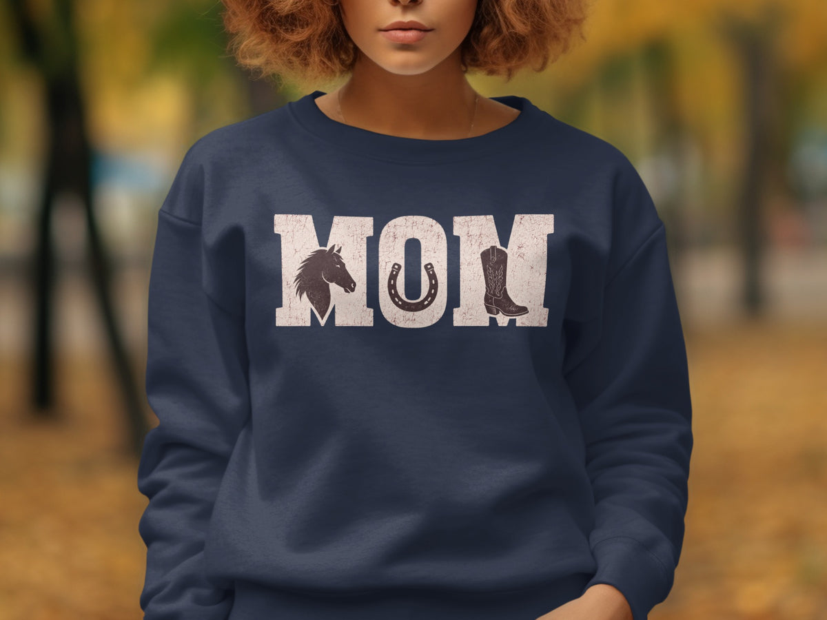 Dark blue sweatshirt with "MOM" text featuring a horse head, horseshoe, and cowboy boot.