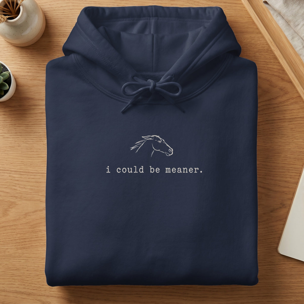 Navy hoodie with a white line drawing of a horse head and text.