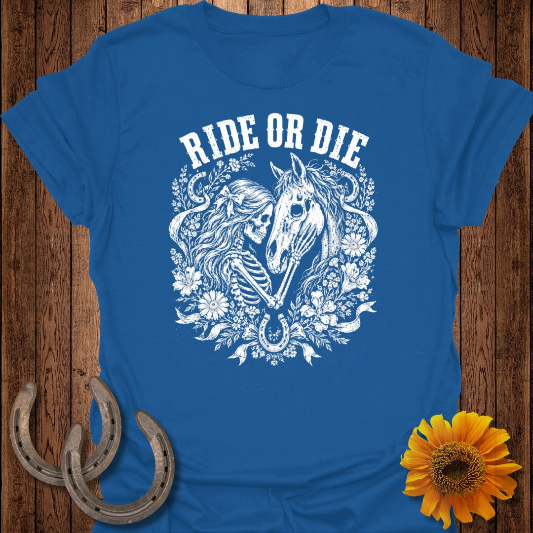 Blue t-shirt with white "Ride or Die" text, skeleton, and horse graphic.