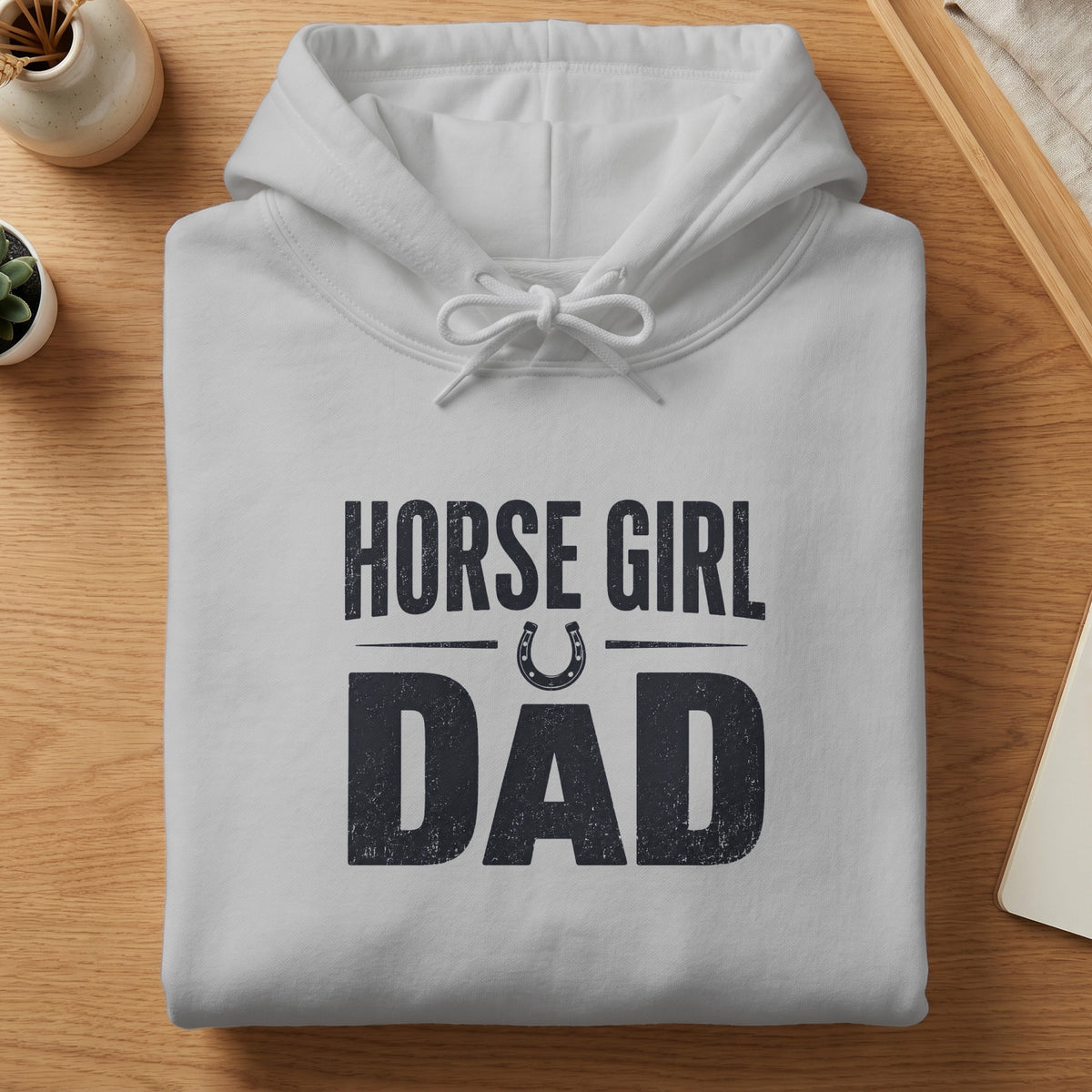 White hoodie with "HORSE GIRL DAD" text and horseshoe graphic.