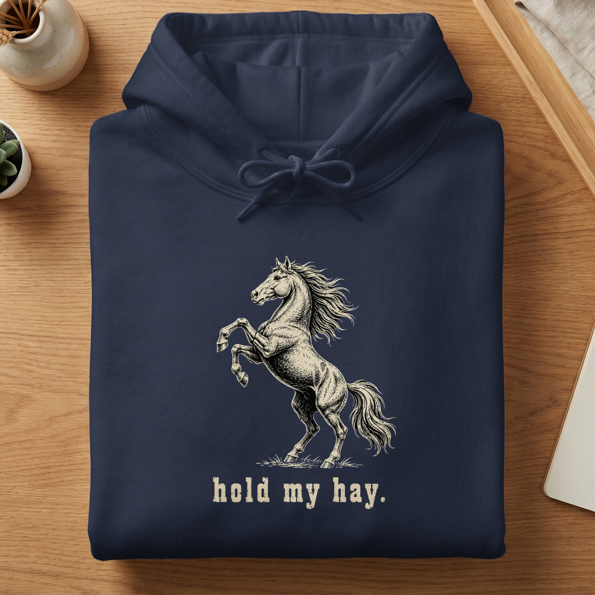 Navy hoodie with rearing horse graphic and text "hold my hay."