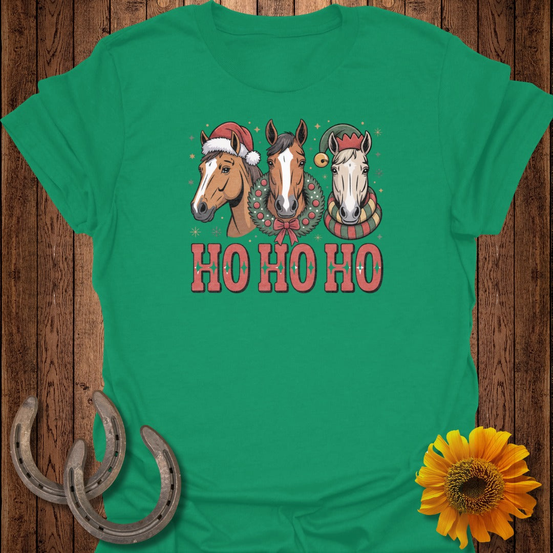 Three horses wear Christmas hats and a wreath with "HO HO HO" text.