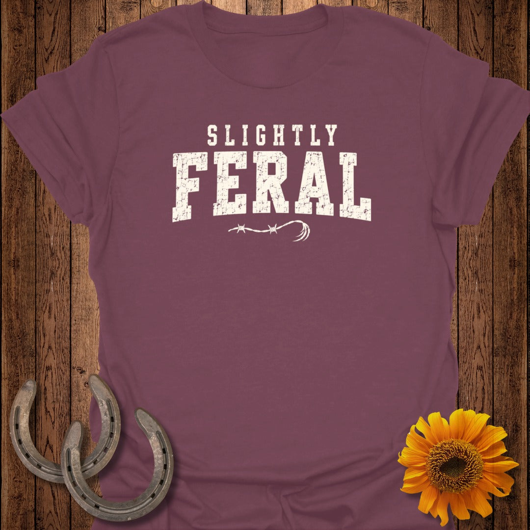 Maroon t-shirt with "Slightly Feral" text and barbed wire design.