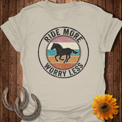 T-shirt with a circular graphic featuring a silhouette of a horse and the text "Ride More Worry Less."