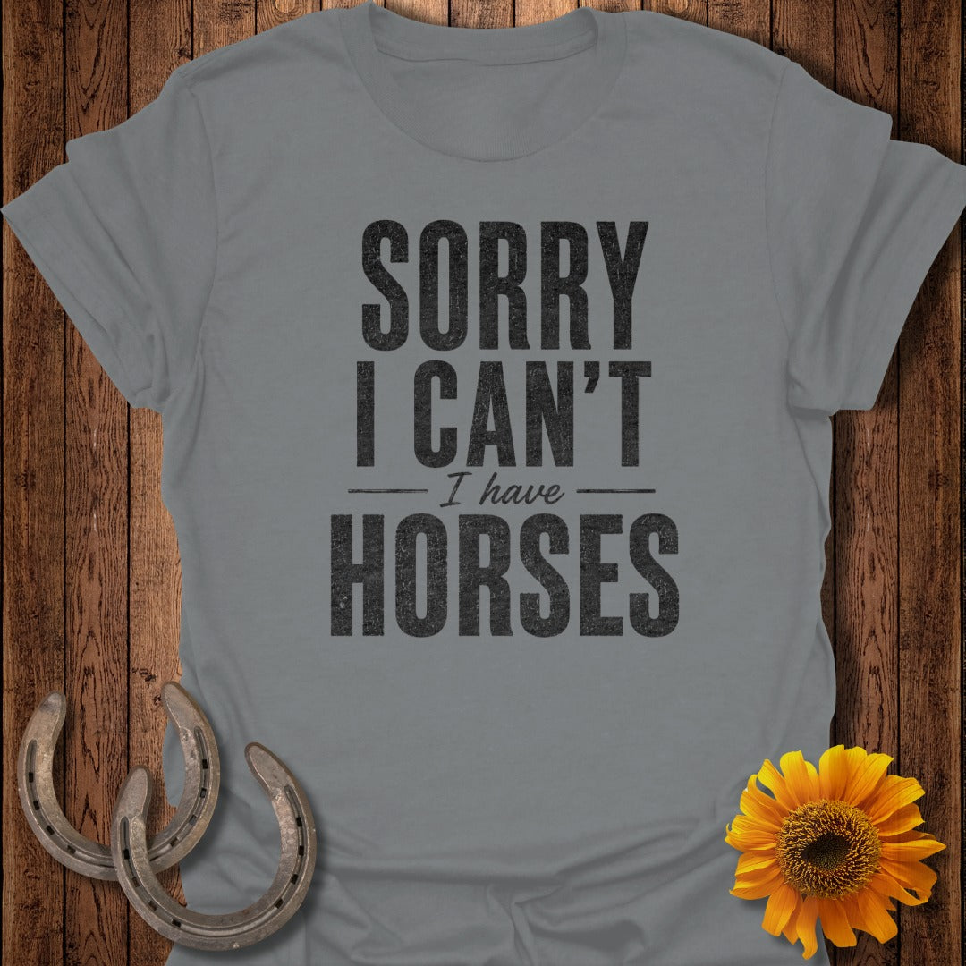 Grey t-shirt with "SORRY I CAN'T HAVE HORSES" text, horseshoes, and sunflower.