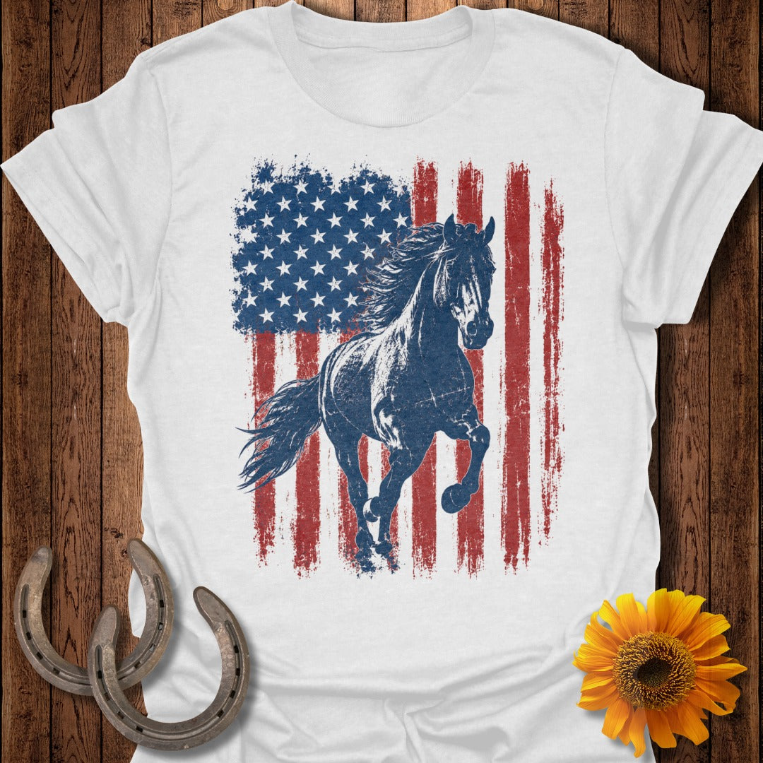 Distressed American flag with a running horse overlay on a white t-shirt.