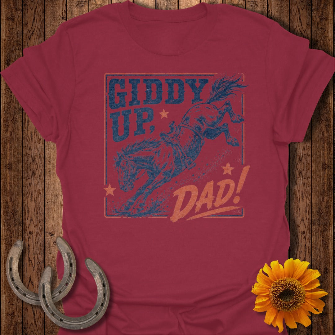 Giddy Up Dad graphic on maroon t-shirt with horse and cowboy.