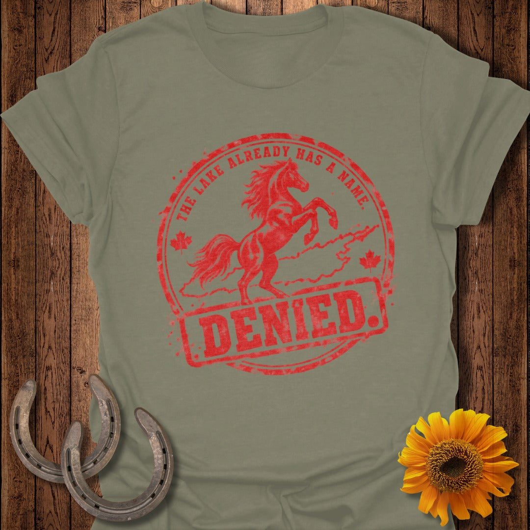 T-shirt with red distressed graphic of a rearing horse and text: The Lake Already Has A Name. Denied.