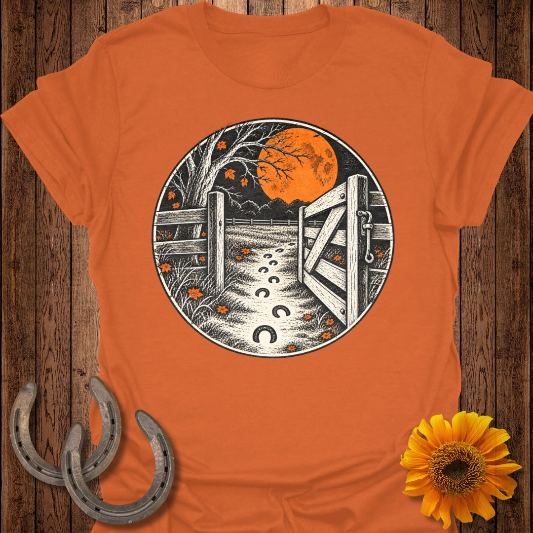 Circular graphic of a moonlit farm path with open gate and horseshoe prints.