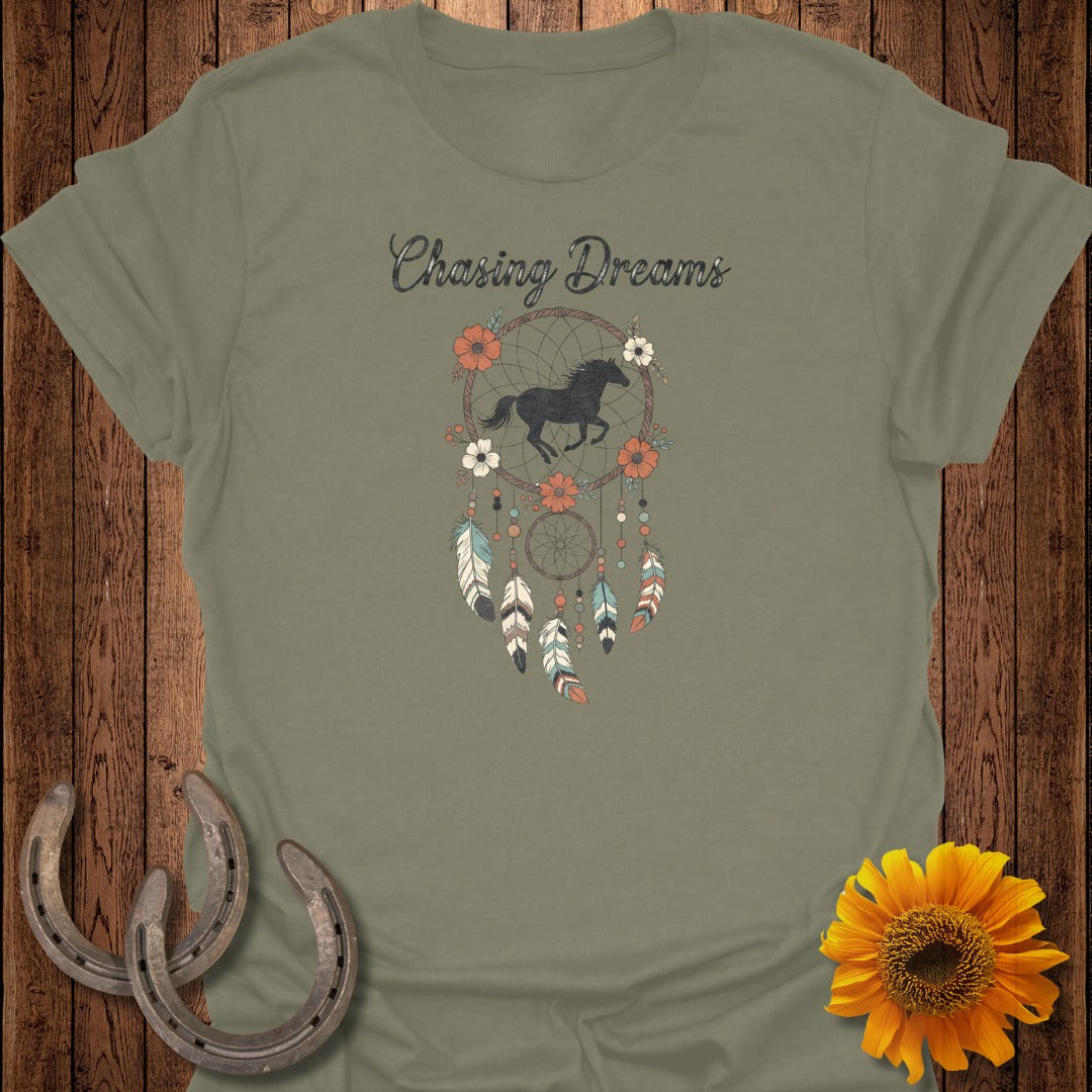 Green t-shirt with "Chasing Dreams" text, horse, and dreamcatcher graphic.