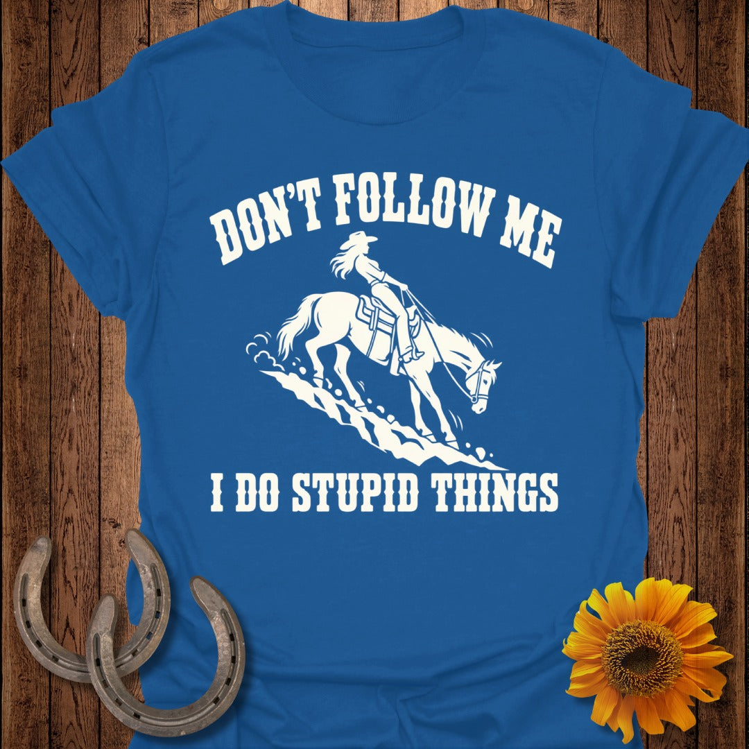 Blue t-shirt with white graphic: "DON'T FOLLOW ME, I DO STUPID THINGS".