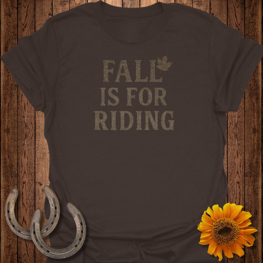 Brown t-shirt with "FALL IS FOR RIDING" text and a maple leaf.