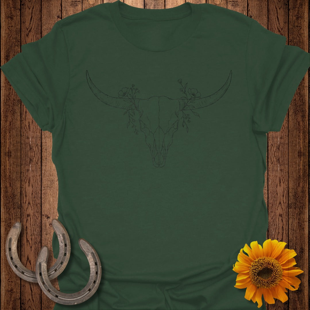 Dark green t-shirt with line art of a bull skull and flowers, two horseshoes, and a sunflower.