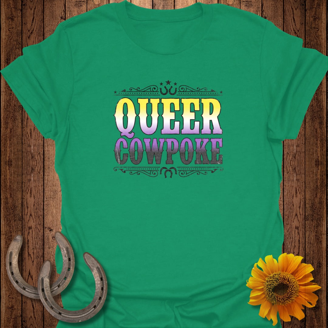 Green t-shirt with "Queer Cowpoke" text and horseshoe accents.