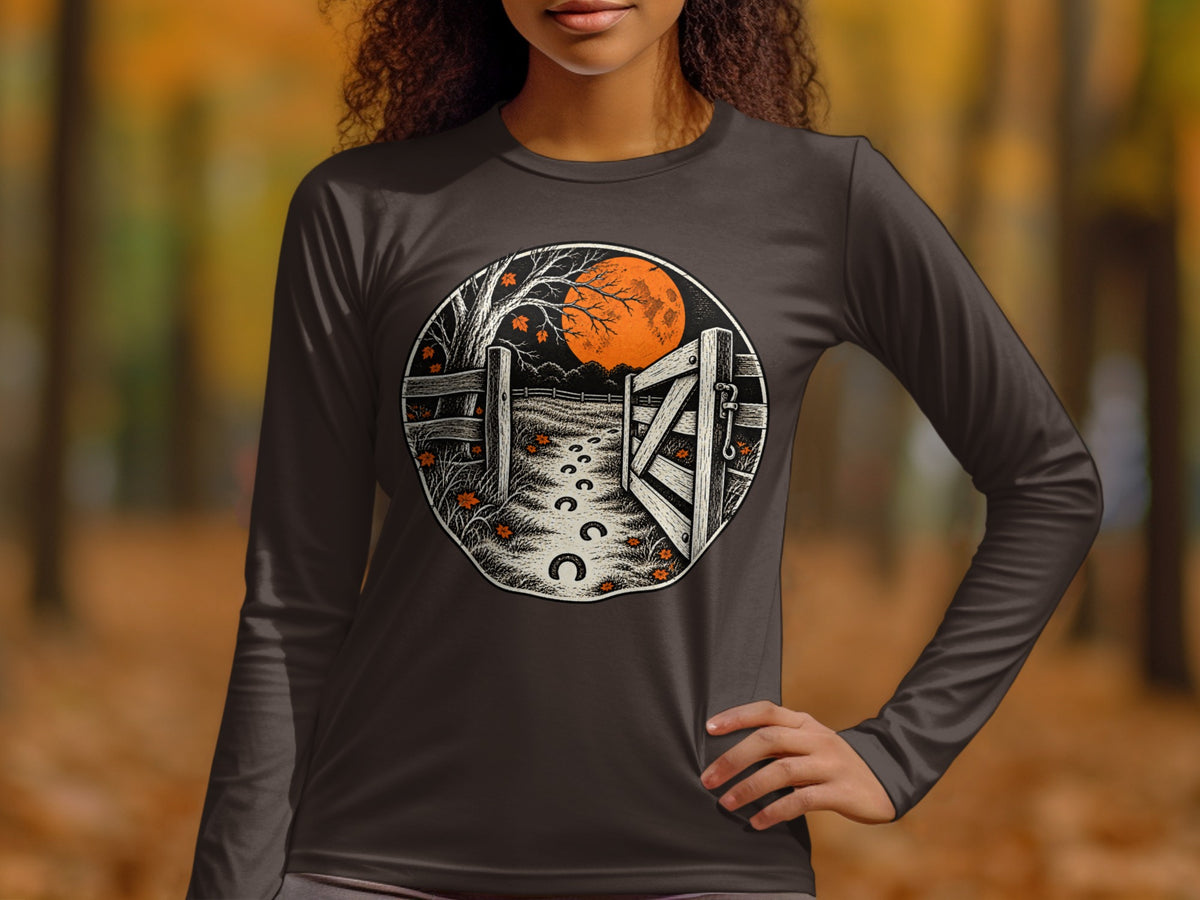 Long sleeve shirt with circular graphic of an open gate, moon, and autumn scene.