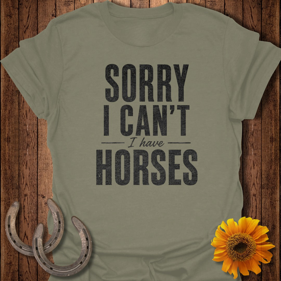 Olive green t-shirt with "SORRY I CAN'T I HAVE HORSES" text.
