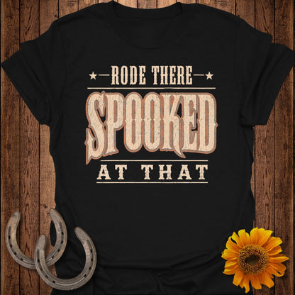 Black t-shirt with "Rode There Spooked At That" text and rodeo theme.