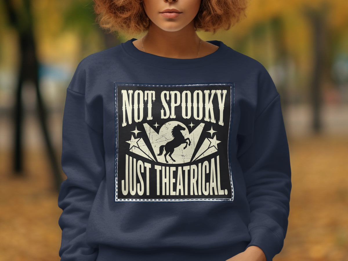 Navy sweatshirt with "Not Spooky Just Theatrical" text and a horse graphic.
