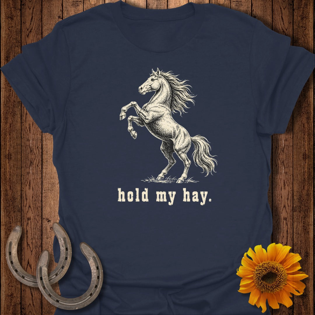 Navy t-shirt with a rearing horse graphic and text "hold my hay."