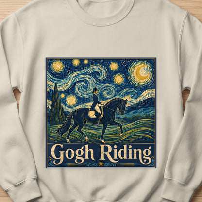 "Gogh Riding" text overlaying equestrian art in Van Gogh style on a tan sweatshirt.