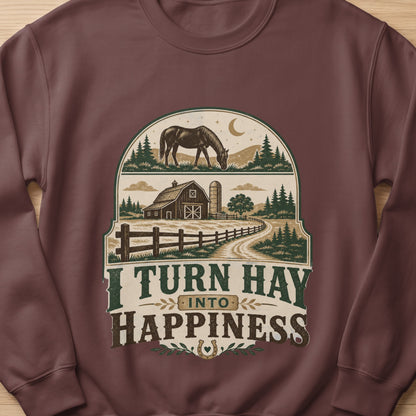 Barn scene with horse, trees, and text "I Turn Hay Into Happiness".
