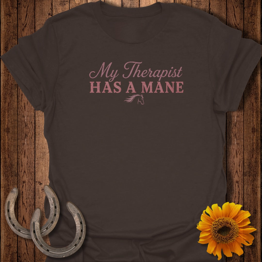Brown t-shirt with pink text "My Therapist HAS A MANE" and a horse graphic.