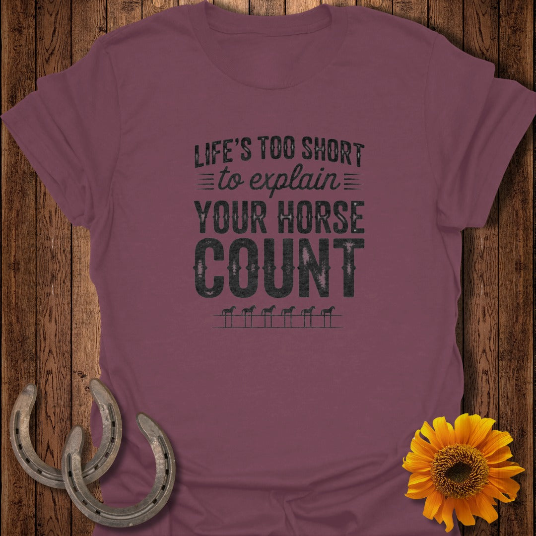 Maroon t-shirt with "Life's Too Short to Explain Your Horse Count" text and horse shoe graphic.