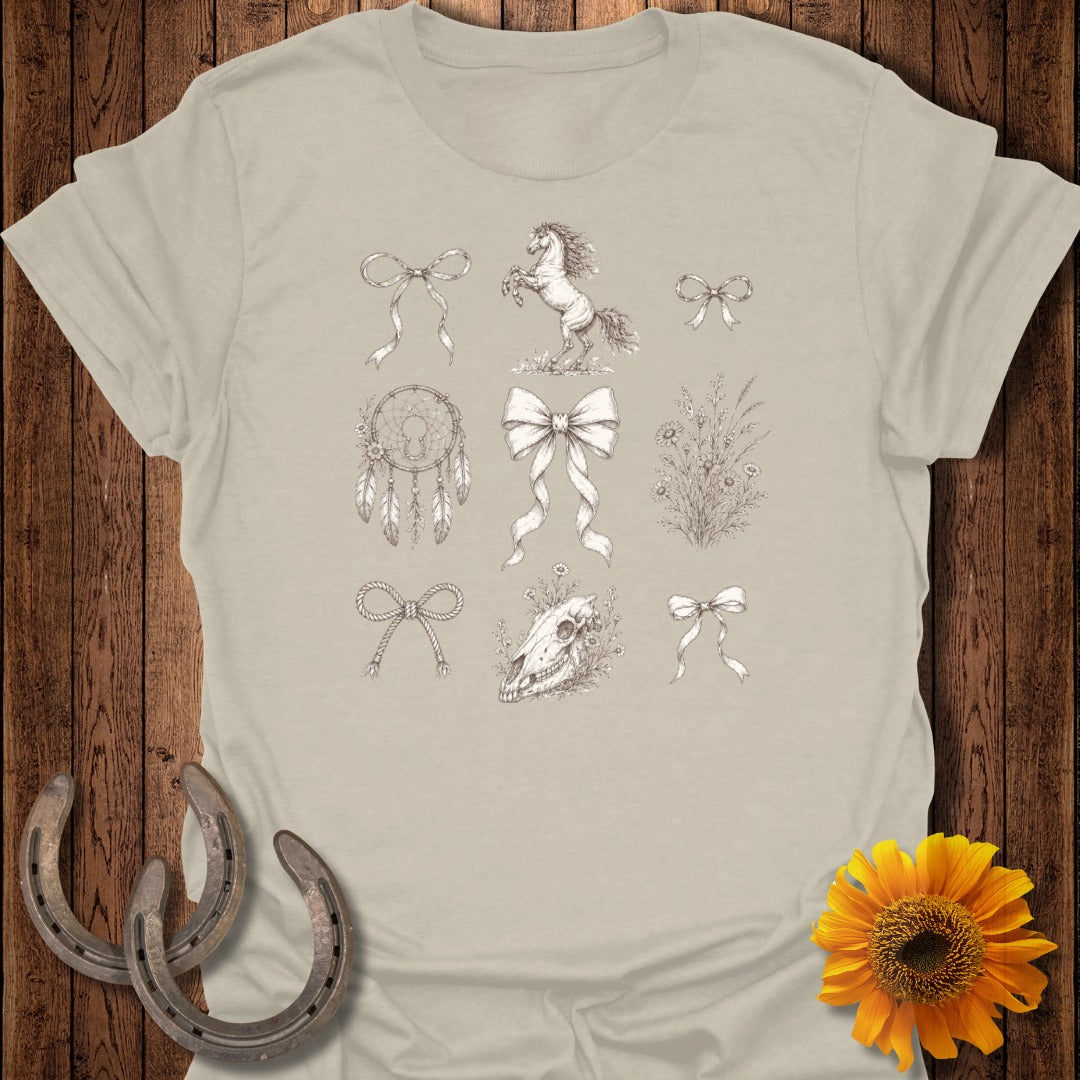 T-shirt with whimsical cowboy-themed illustrations: horses, bows, dreamcatcher, and flowers.