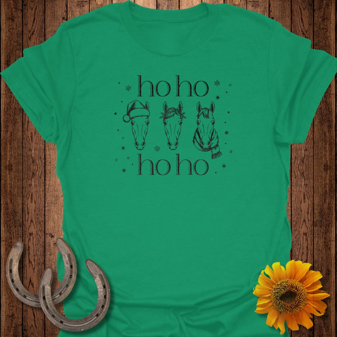 Green t-shirt with three horse heads, Santa hat, and "ho ho ho" text.