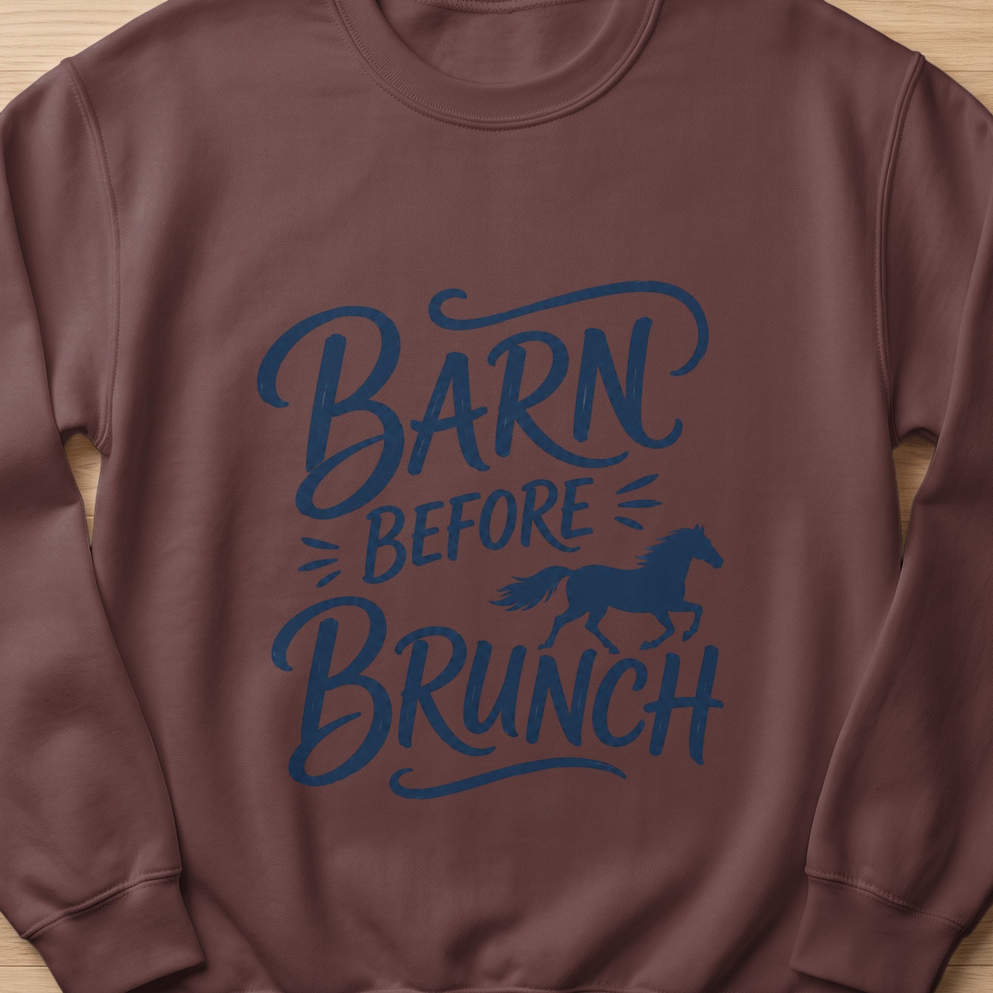 Brown sweatshirt with blue text "Barn Before Brunch" and a horse silhouette.