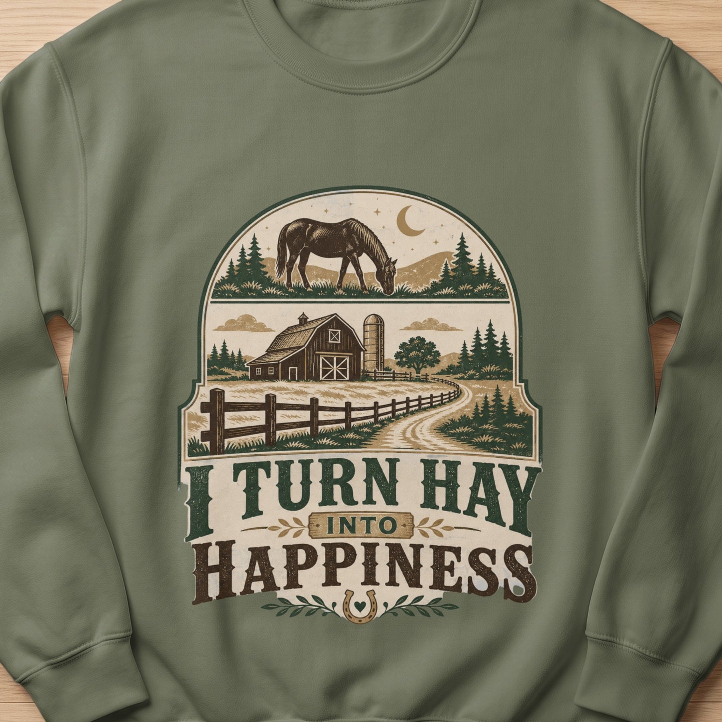 Green sweatshirt with barn, horse, and text "I TURN HAY INTO HAPPINESS".