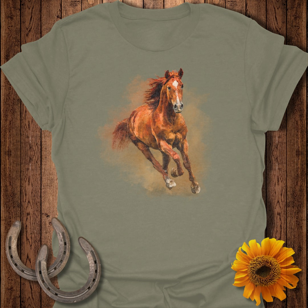 Brown horse in full stride on a taupe t-shirt, flanked by horseshoes and sunflower.