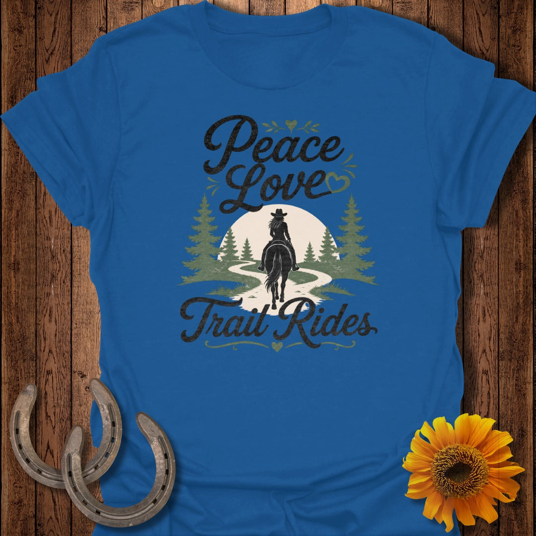 Blue t-shirt with "Peace Love Trail Rides" text and horseback rider silhouette.