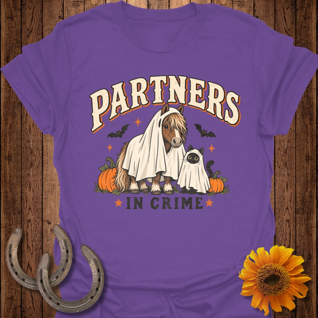 Horse and cat in ghost costumes with text "PARTNERS IN CRIME".