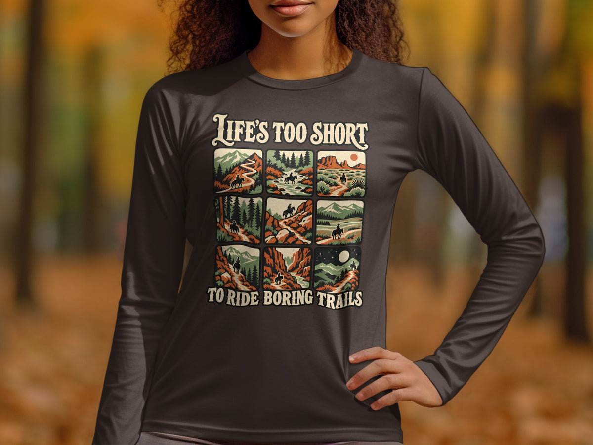 Long-sleeve shirt with graphic of nine outdoor scenes and text "Life's Too Short To Ride Boring Trails".