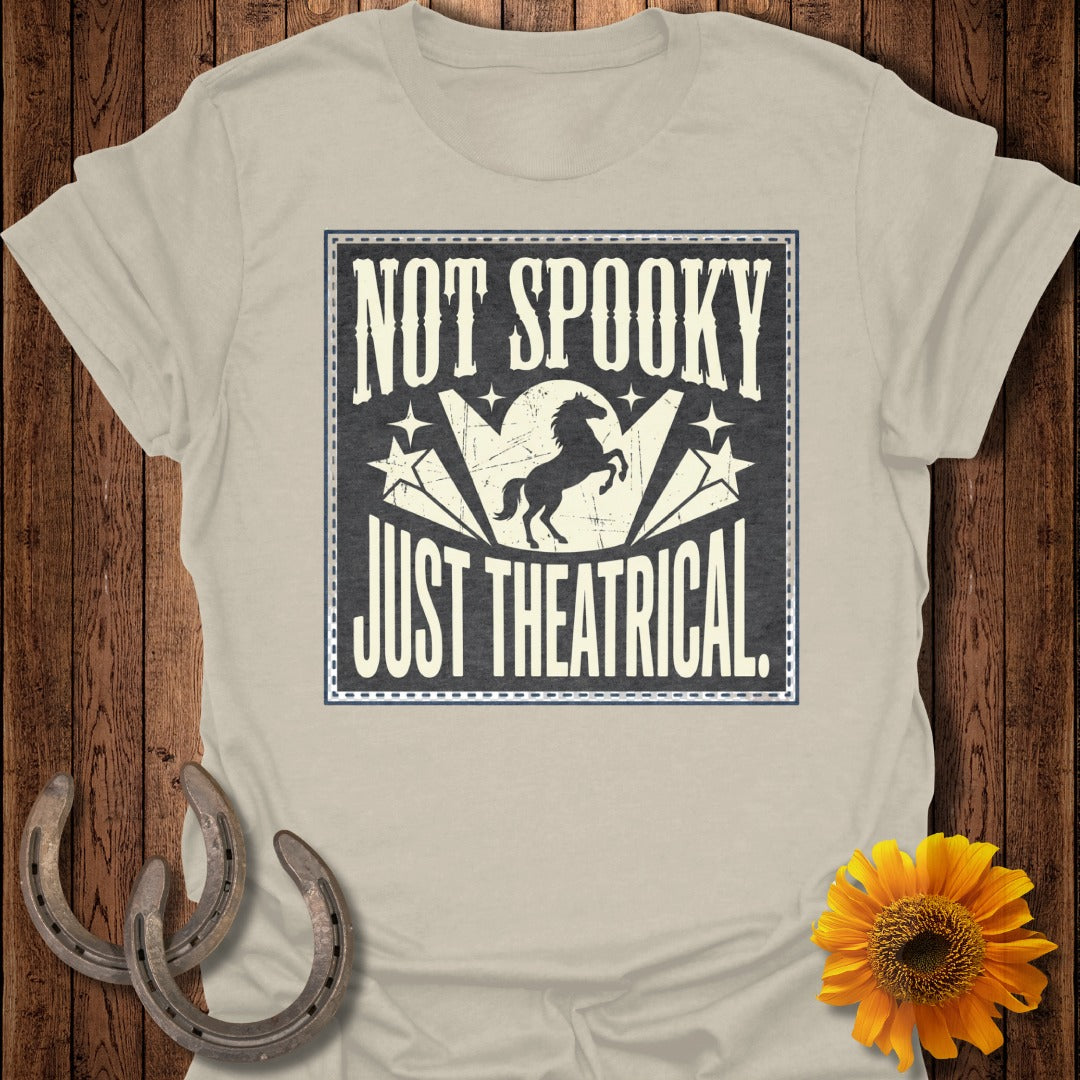 T-shirt with "NOT SPOOKY JUST THEATRICAL" text and horse silhouette.
