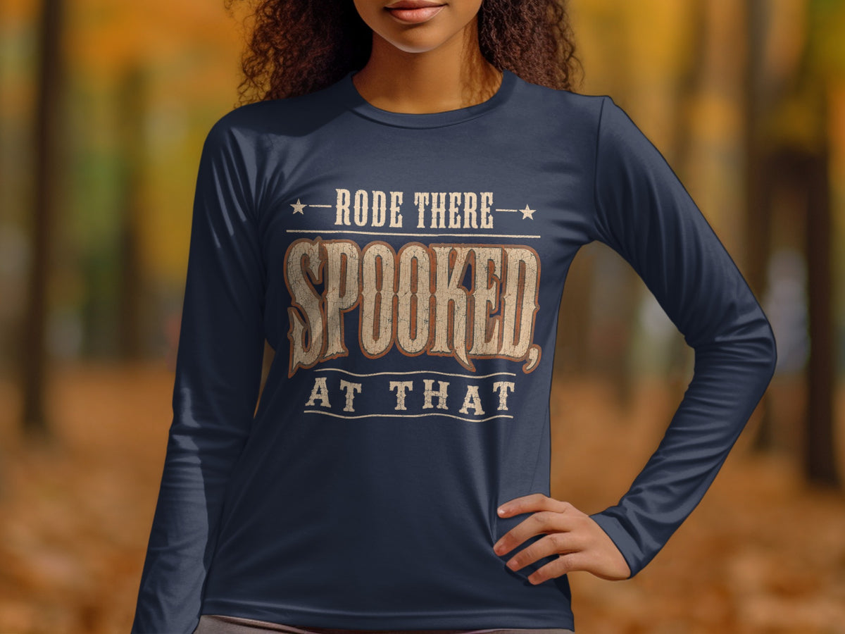 Dark blue long-sleeve shirt with text: "RODE THERE SPOOKED, AT THAT"