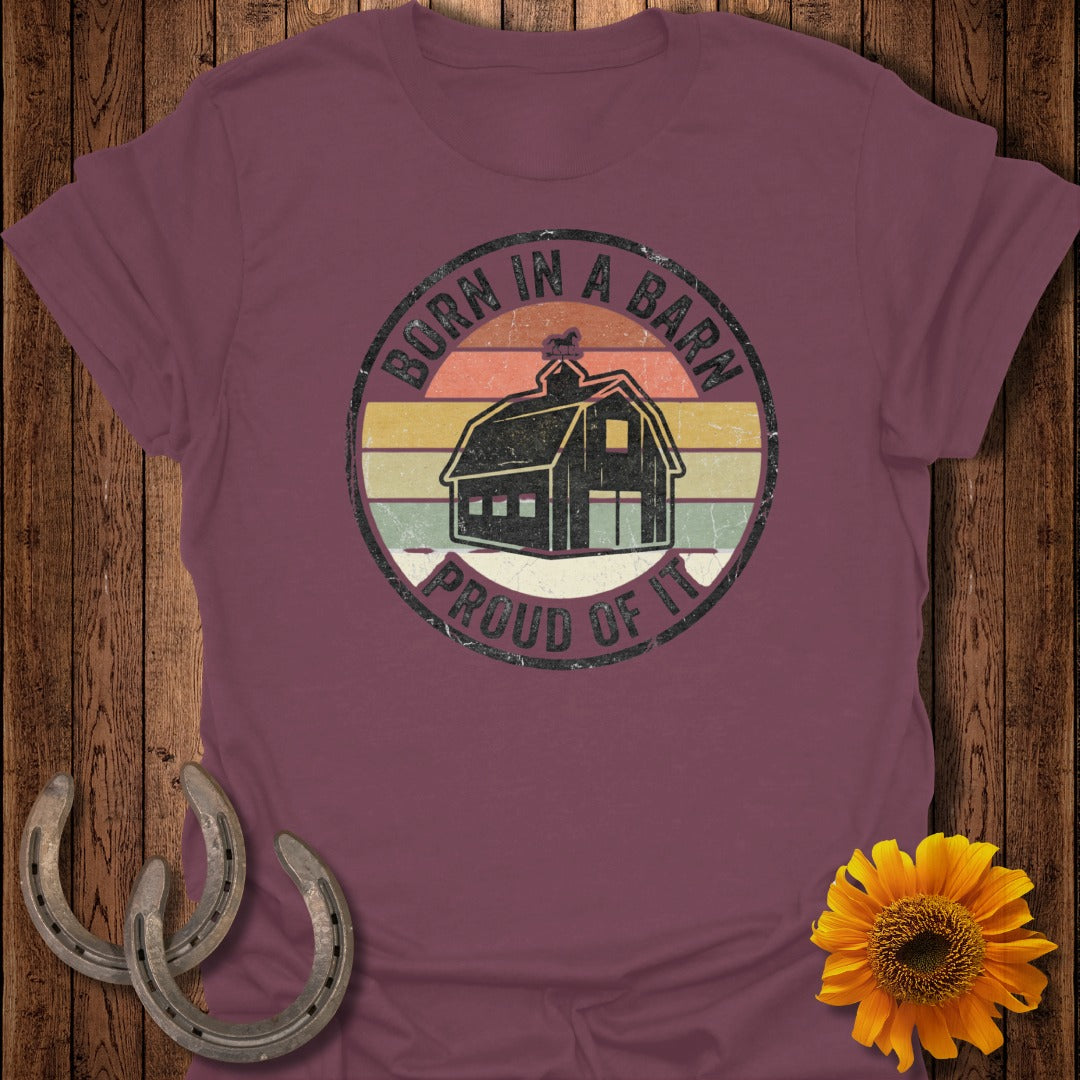 Burgundy t-shirt with "Born in a Barn Proud of It" text and barn graphic.