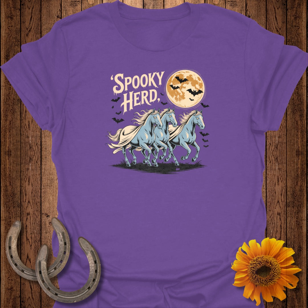 Purple t-shirt with 'Spooky Herd' text, three blue horses, bats, and a full moon.