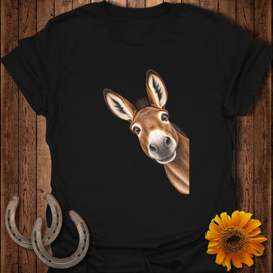 Black t-shirt with a curious donkey peeking from the side.
