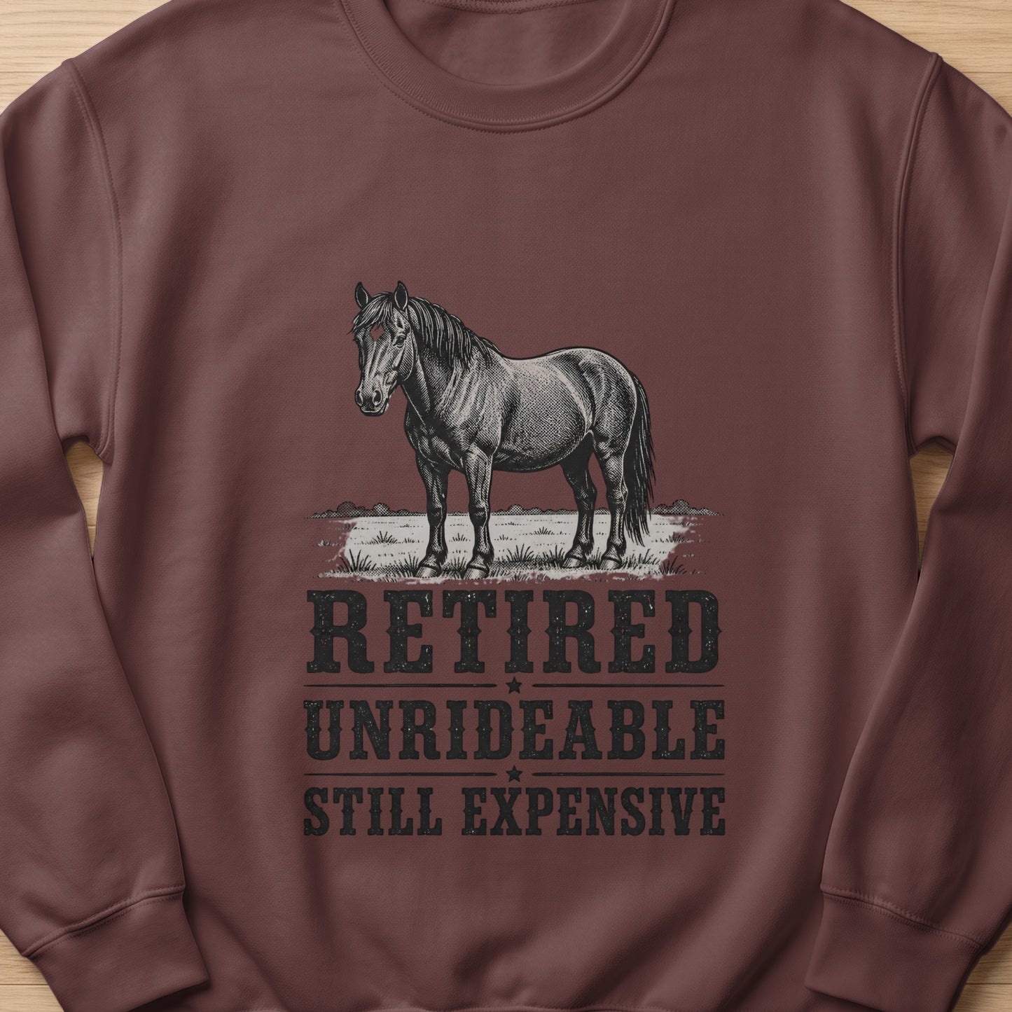 Black and white drawing of a horse with text "RETIRED UNRIDEABLE STILL EXPENSIVE".